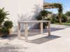 Pietra stone top outdoor bar table on a sunny villa patio in Dubai