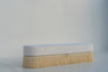 End of bed storage bench with cream bullion fringe, angled view, handmade in Dubai