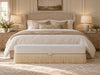 Fringe bench at the foot of a neutral bedroom bed, Savannah storage bench by Adams Furniture Dubai