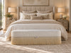 Savannah upholstered storage bench at the end of a king bed, ivory jacquard with cream fringe, Adams Furniture Dubai