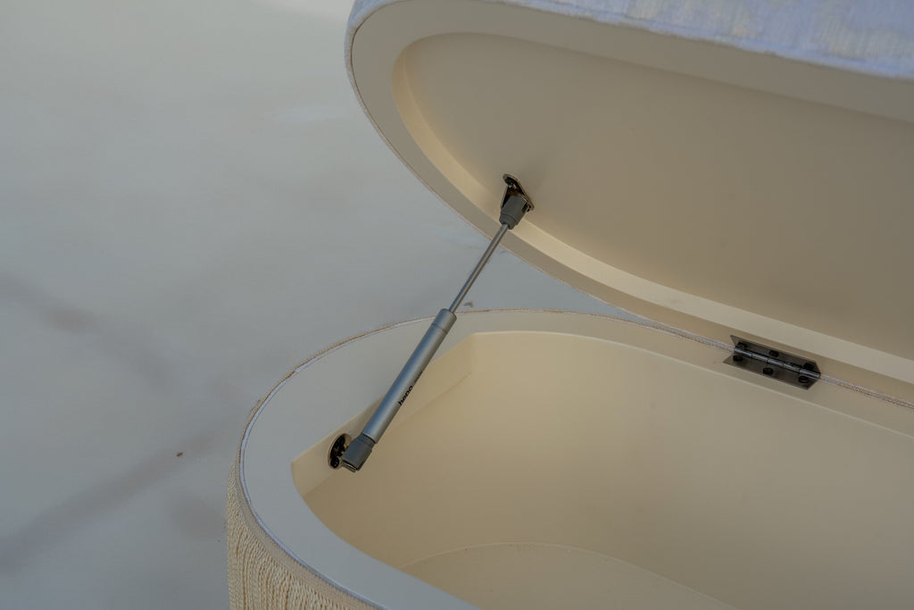 Close-up of gas-assisted lid stay inside the Savannah storage bench