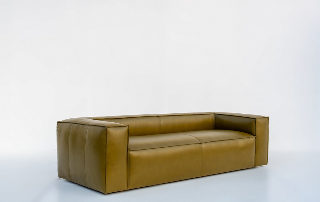 Genuine Italian leather sofa made to order in Dubai, Verde in green, angled view