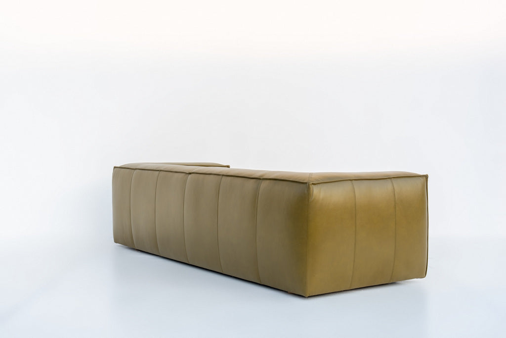 Back of the Verde leather sofa with stitched leather panels, finished on all sides