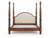 Carved solid wood four poster bed with reeded posts, urn finials and camelback linen headboard on white